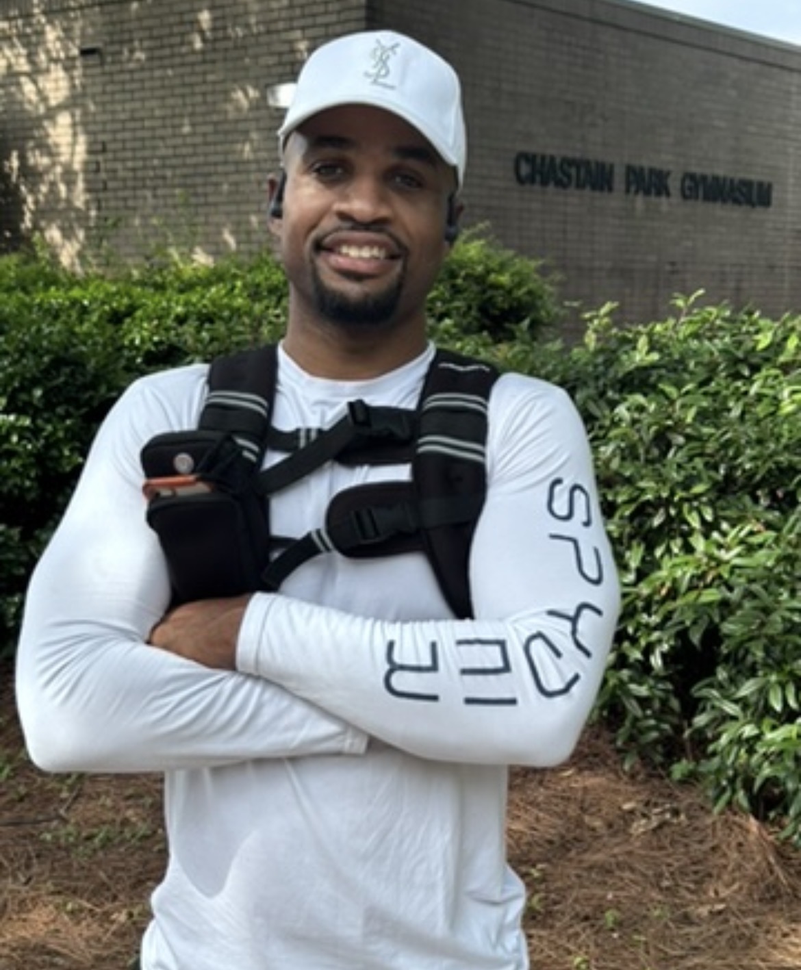 Coach Mike outdoors in athletic clothing